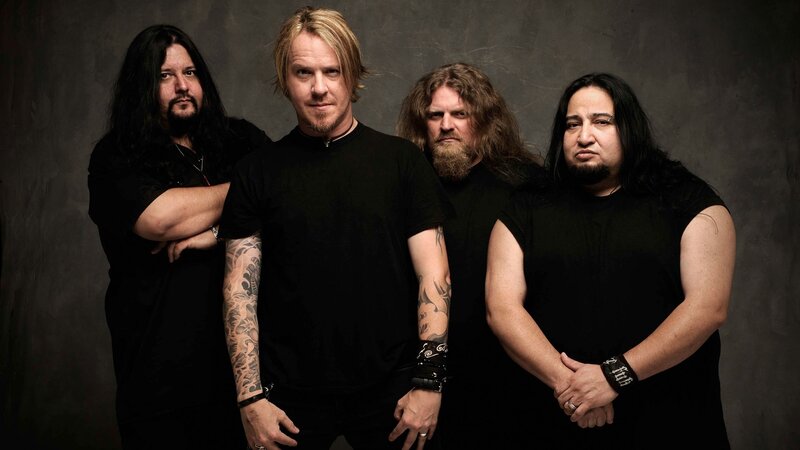 band members in black shirts