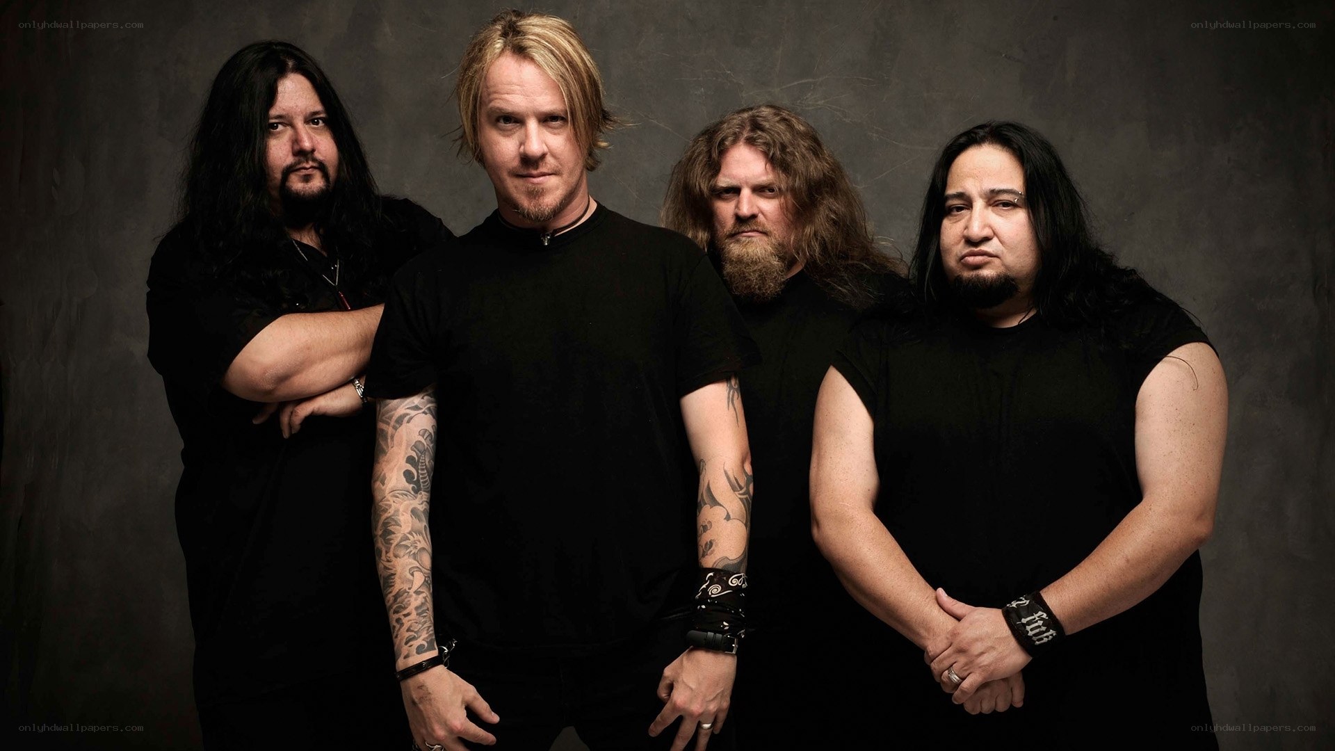 band members in black shirts