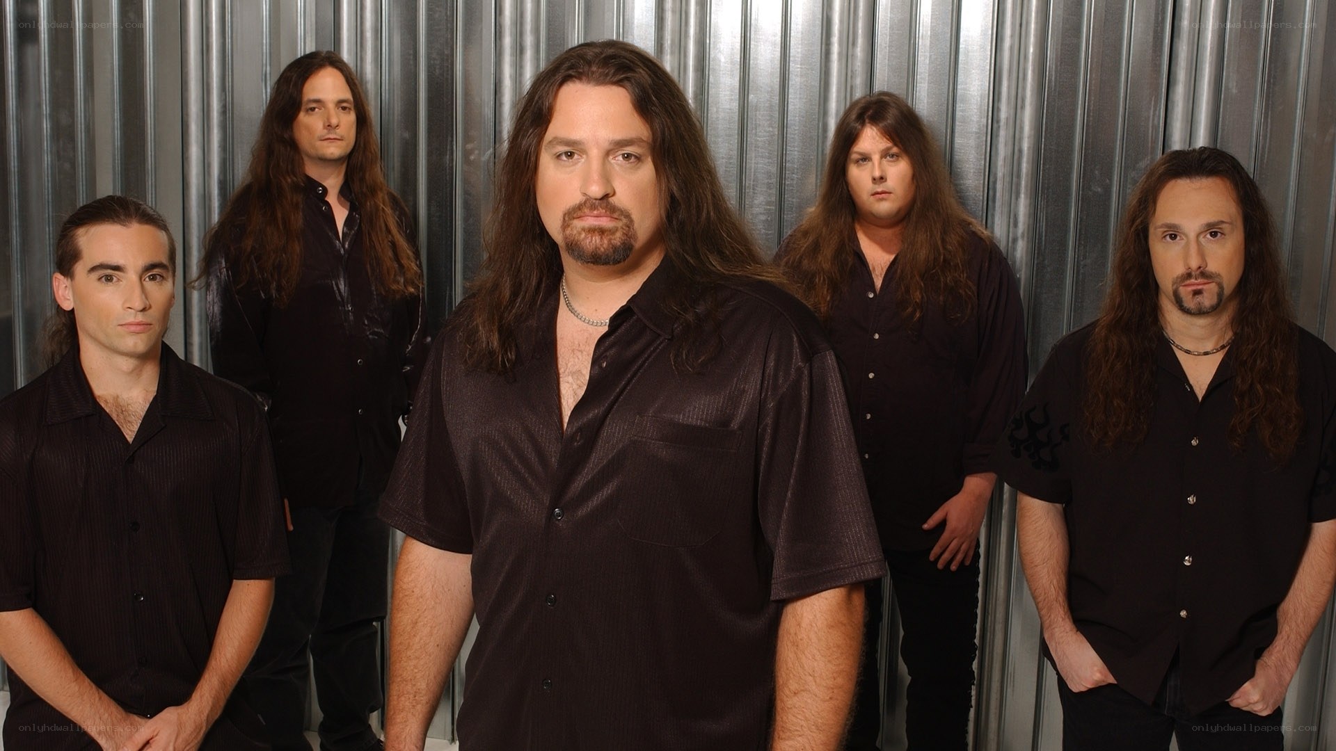 band members in black shirts