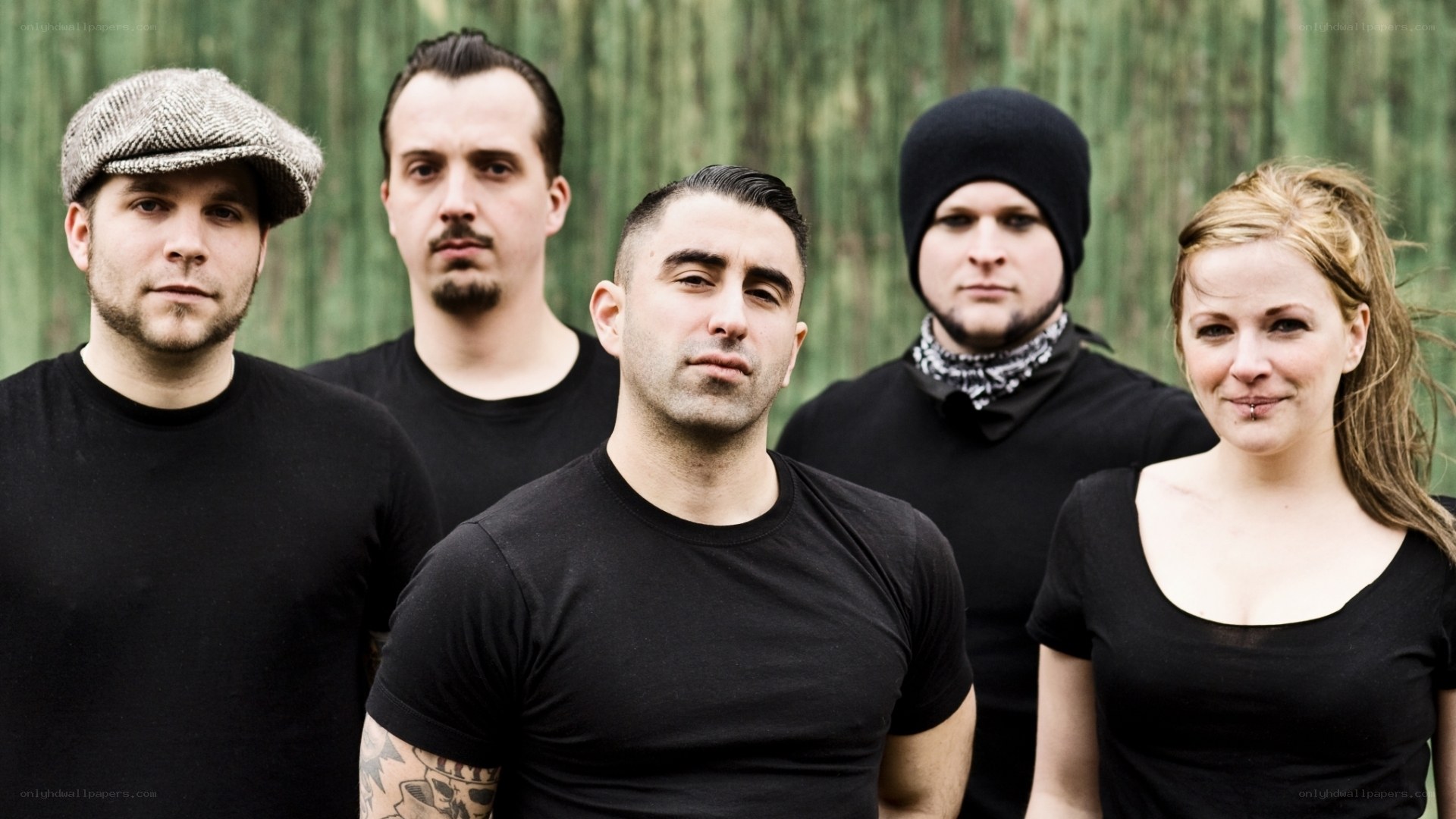 band members in black shirts
