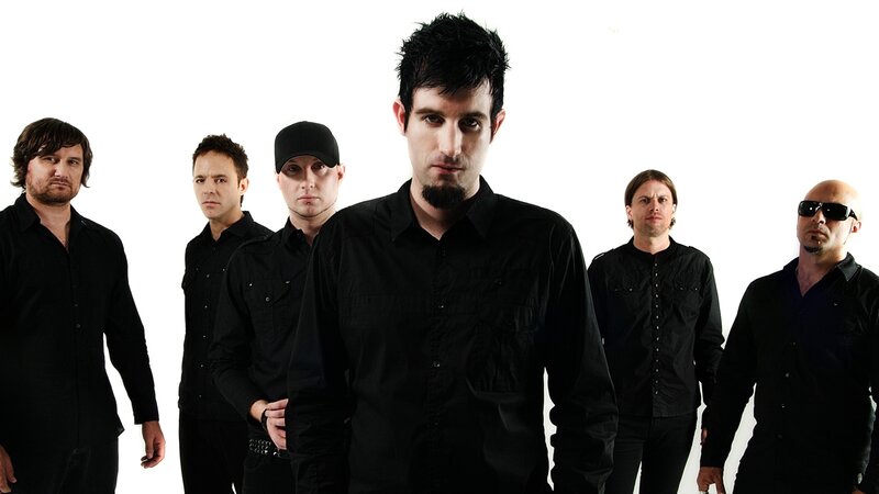 Band Members in Black Shirts — Serious