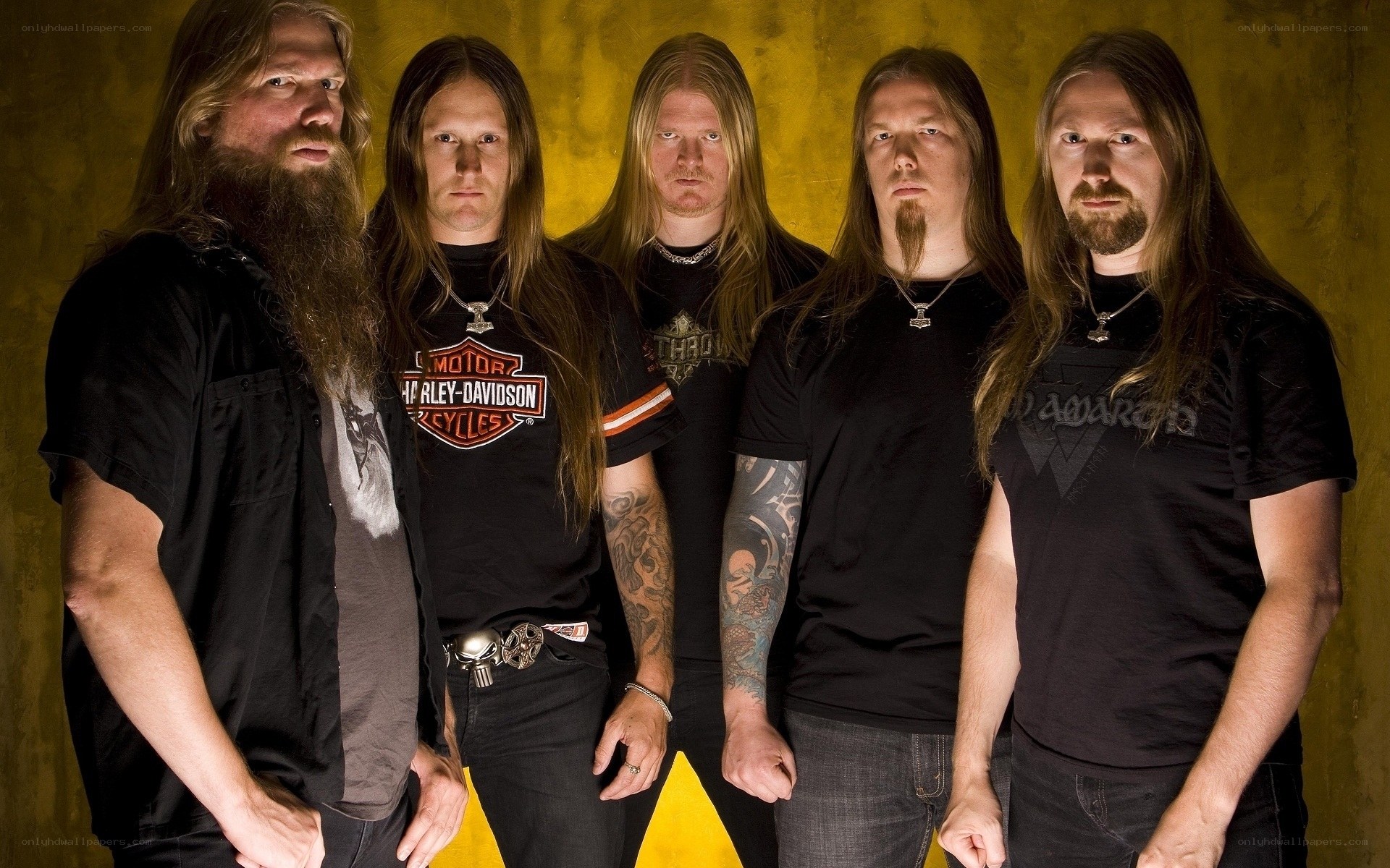 band members in black shirts
