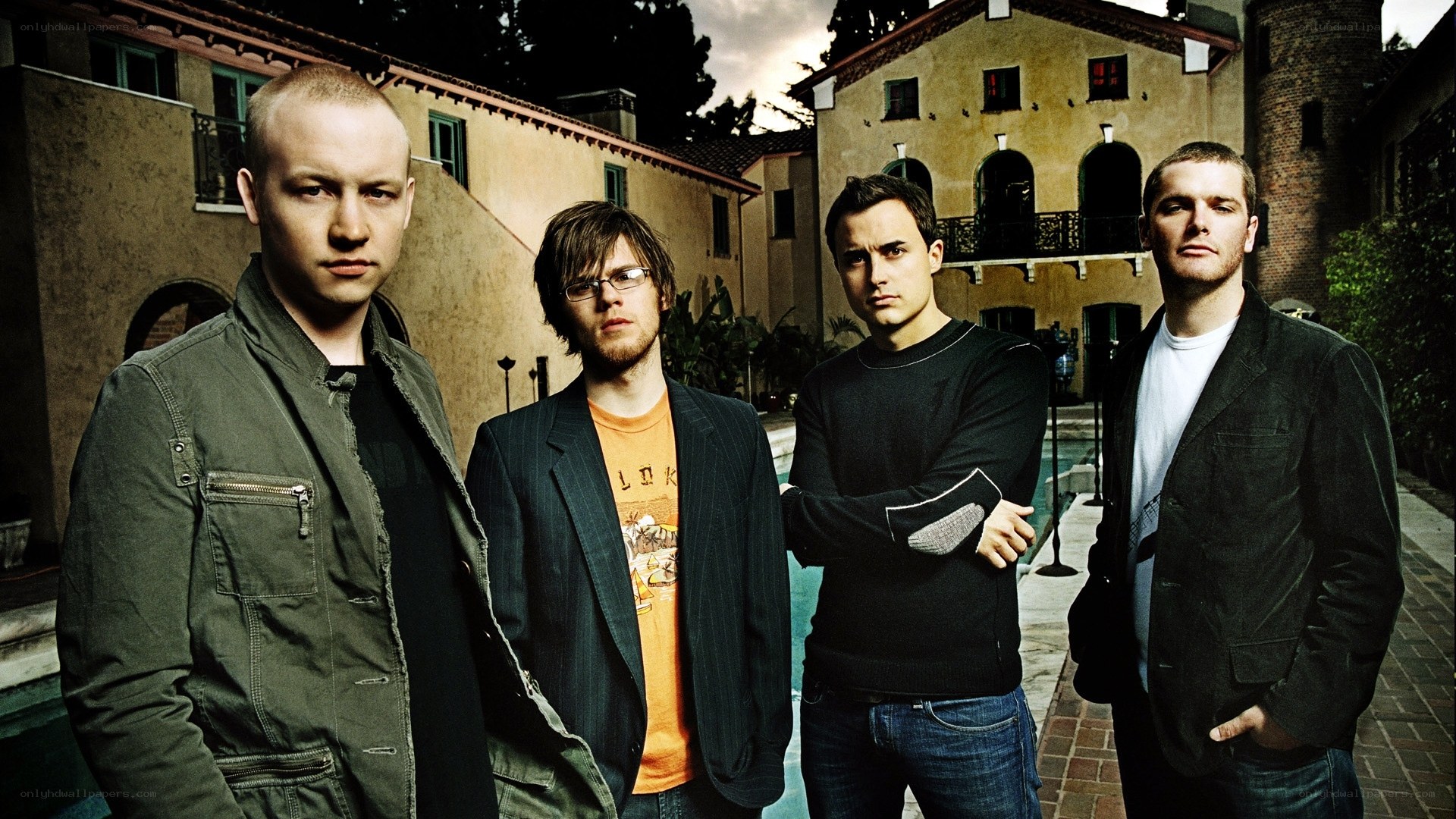 band members in courtyard