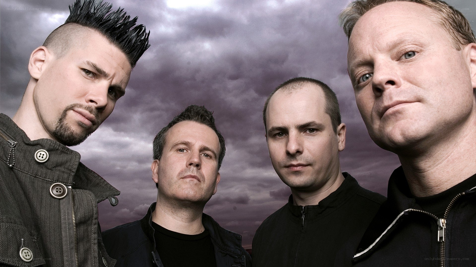 band members in dark attire