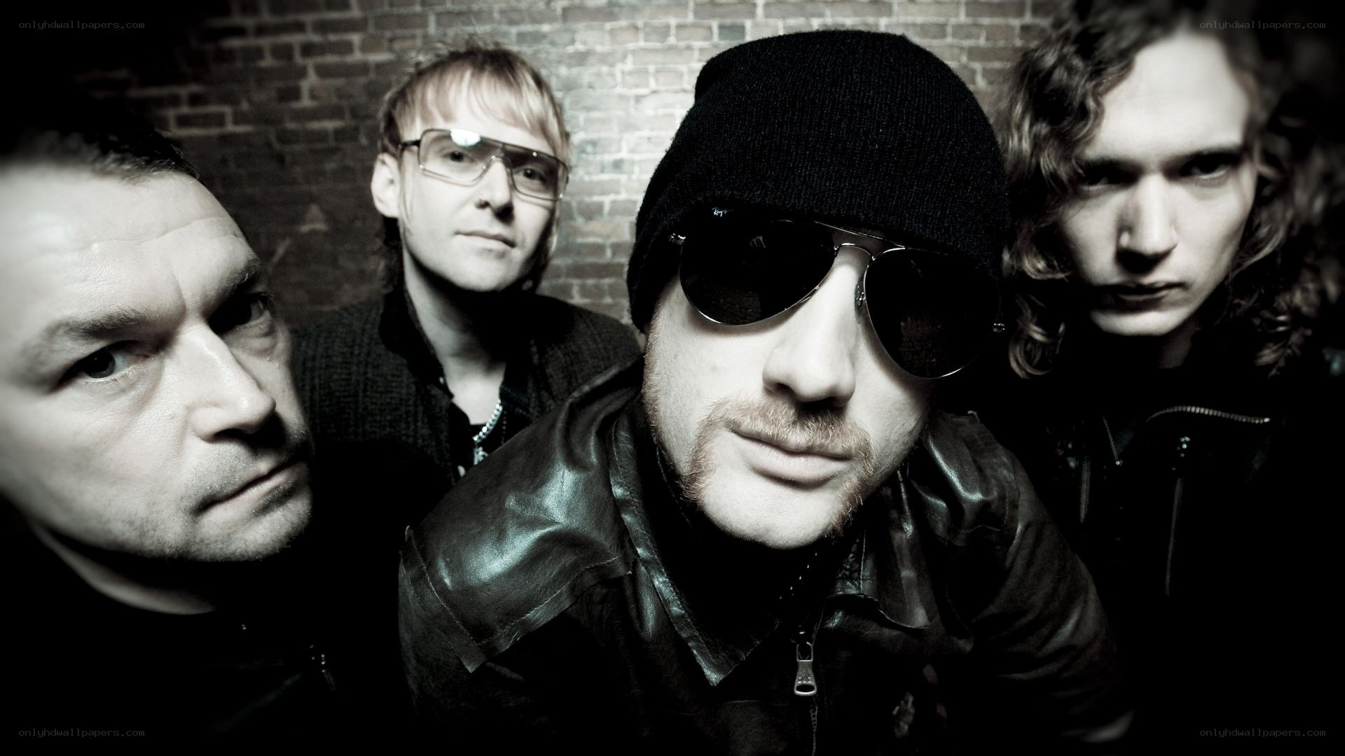band members in dark attire