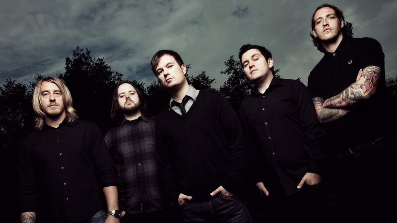 band members in dark clothing