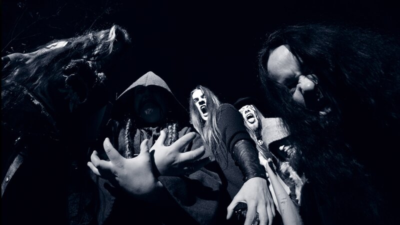 band members in dark costumes