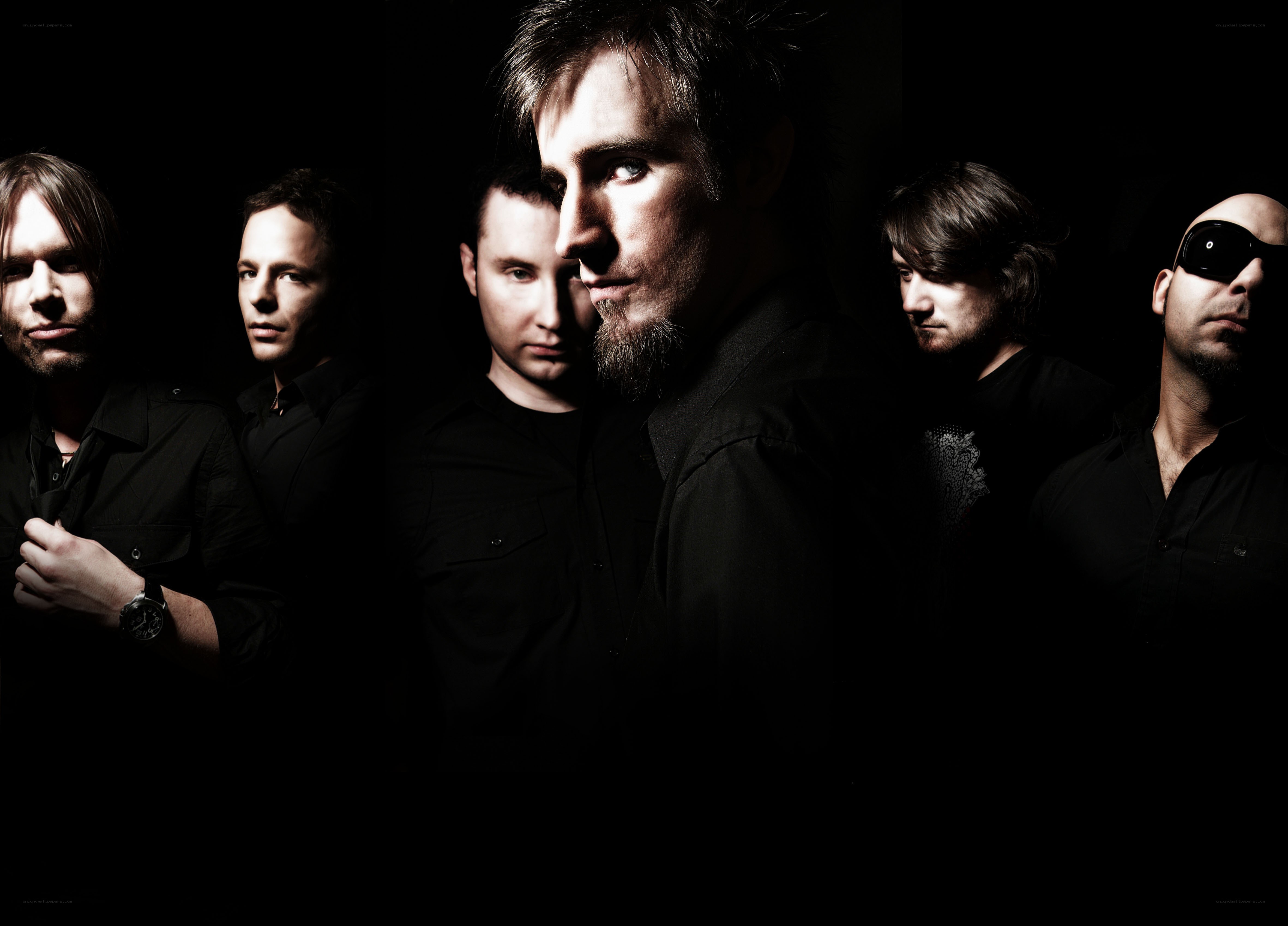 band members in dark lighting