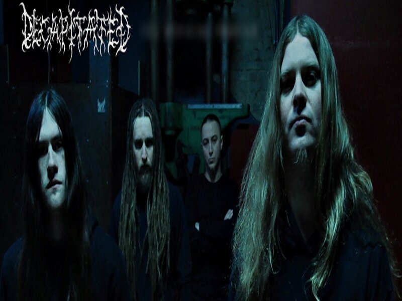 Band Members in Dark Room — Black, Serious, Photograph, Long Hair