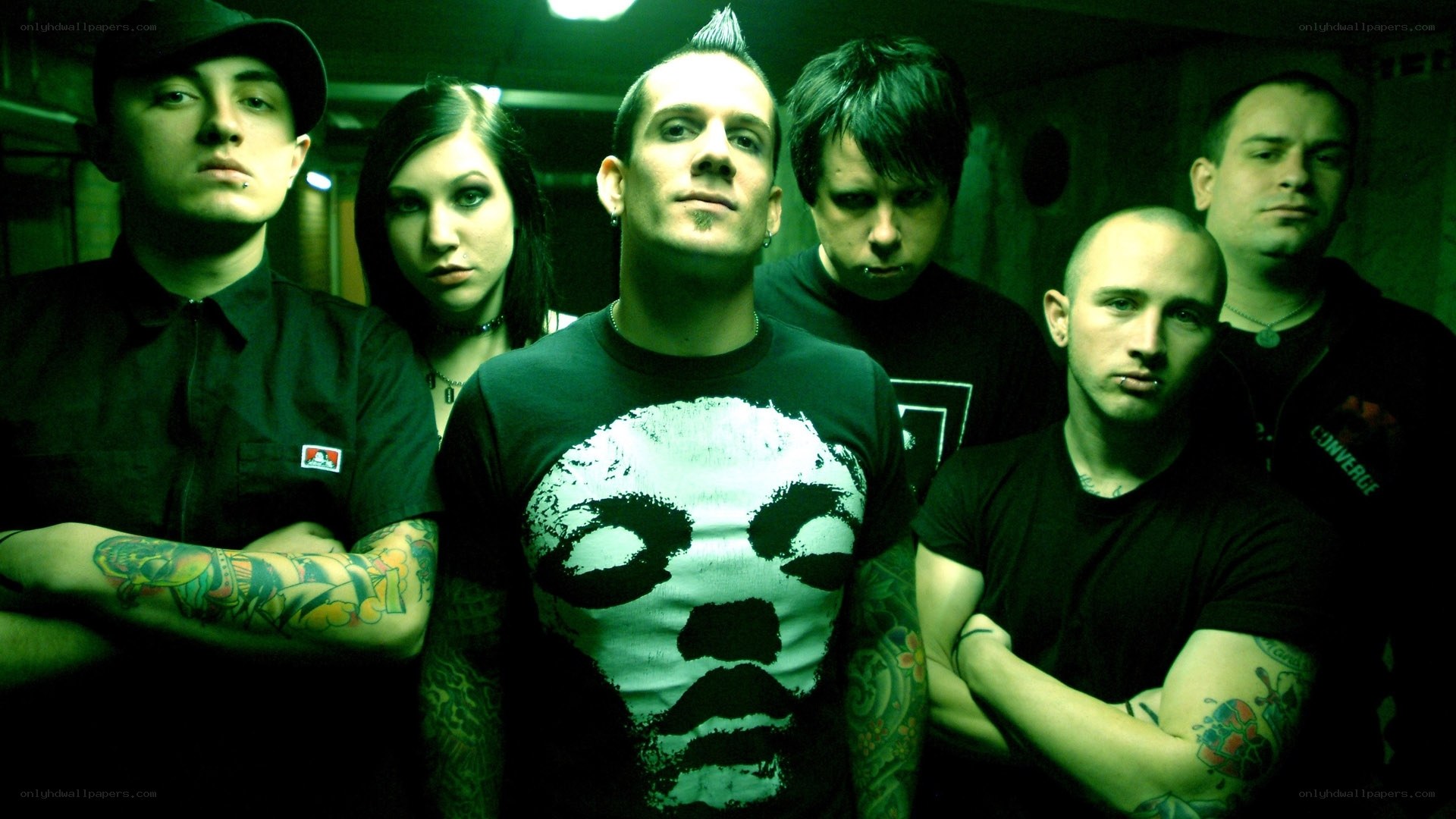 band members in dark room