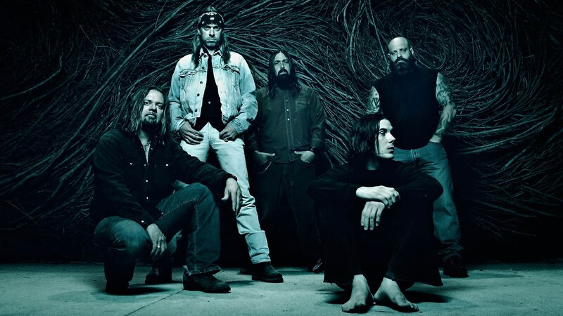 band members in dark setting