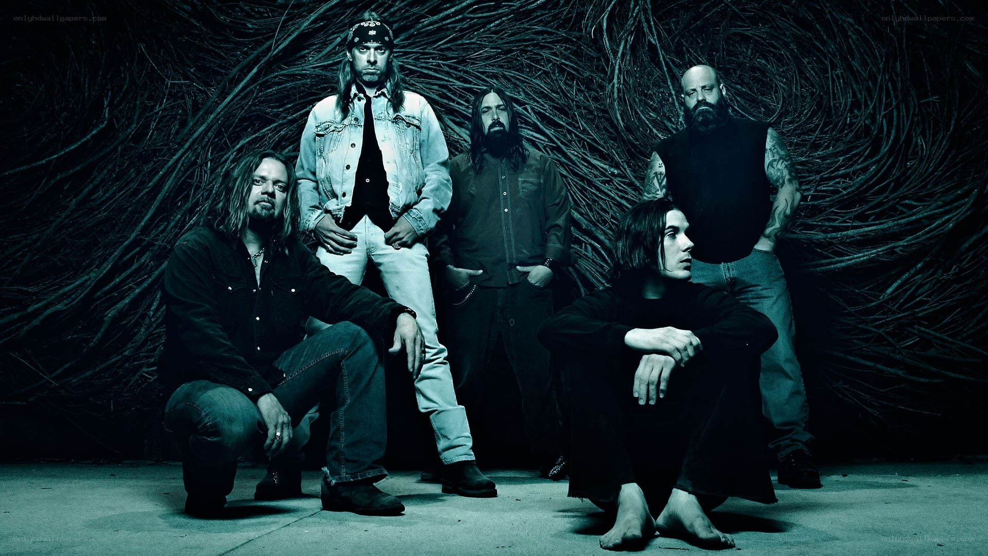 band members in dark setting