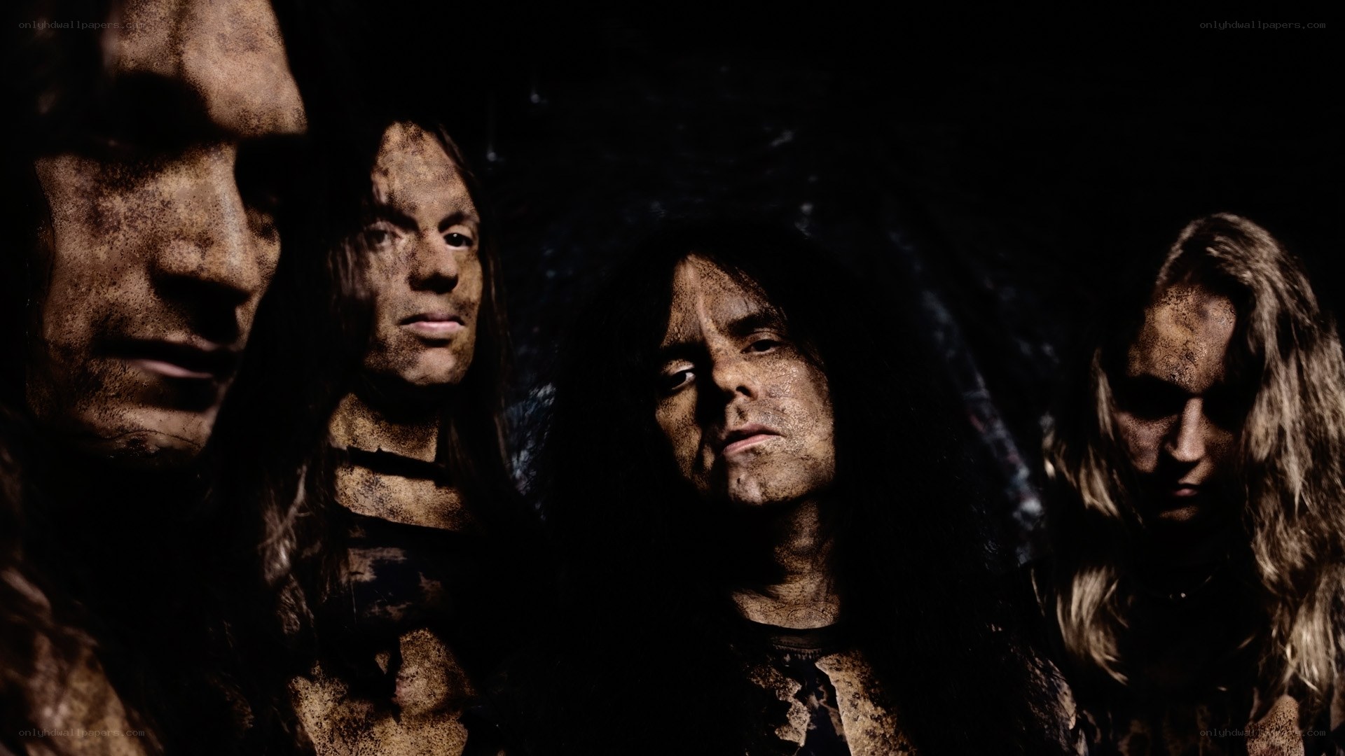 band members in dark setting