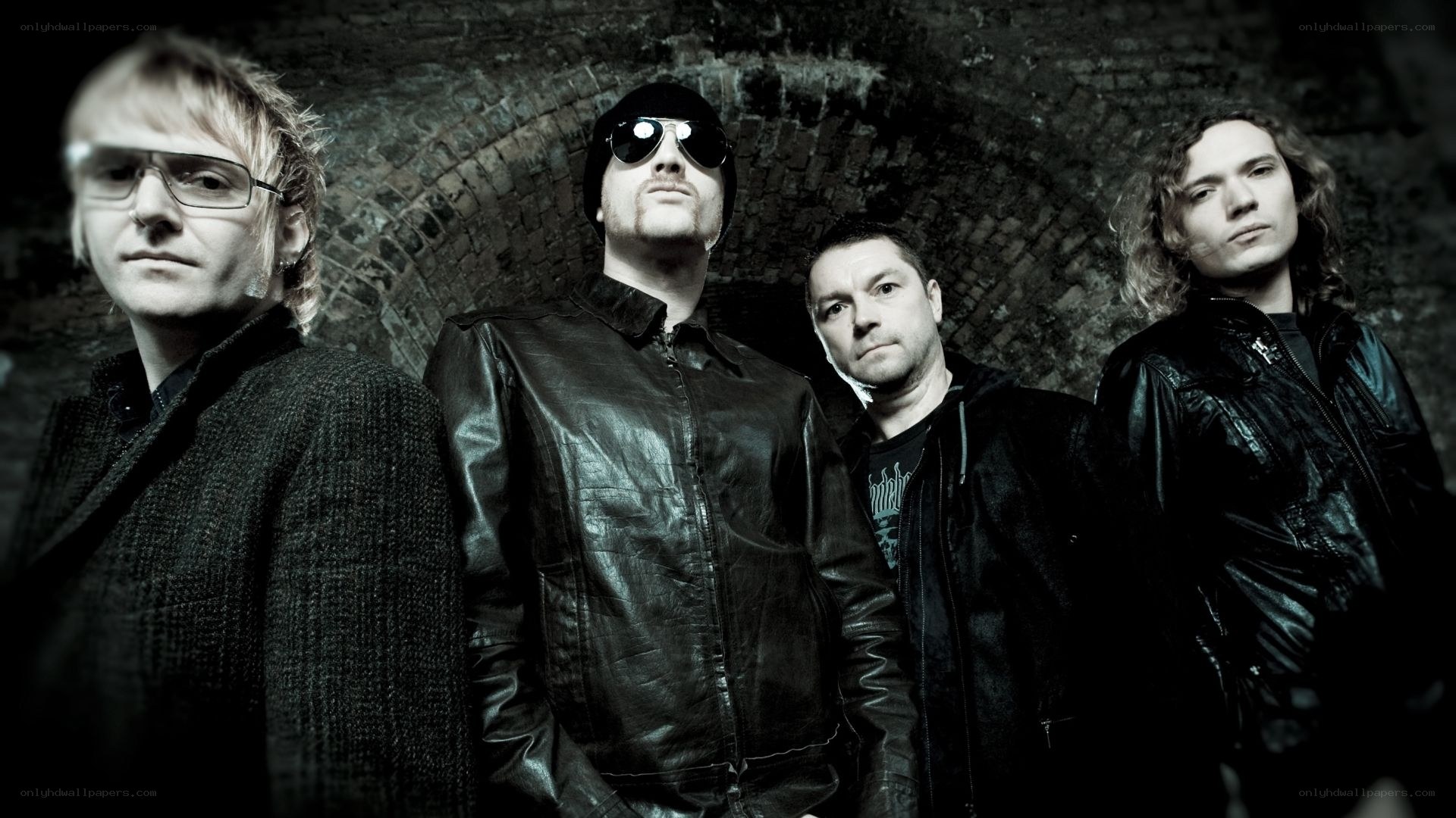 band members in dark setting