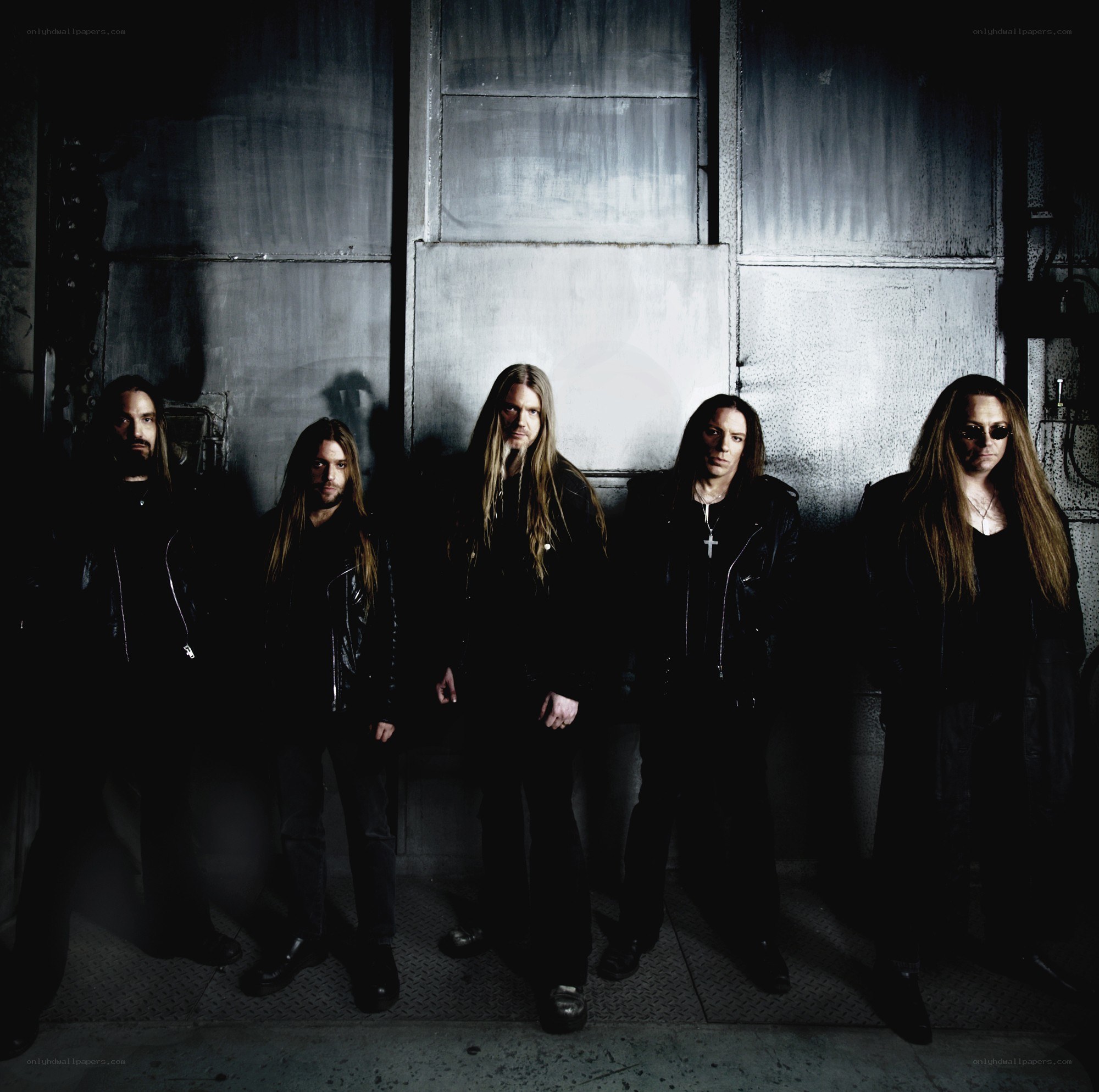 band members in dark setting
