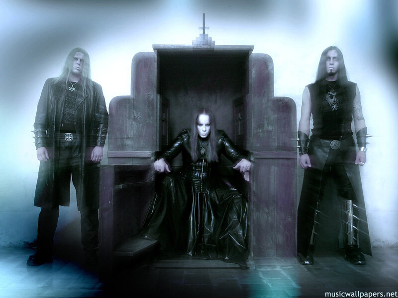 band members in dark setting