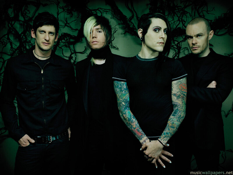 band members in dark setting