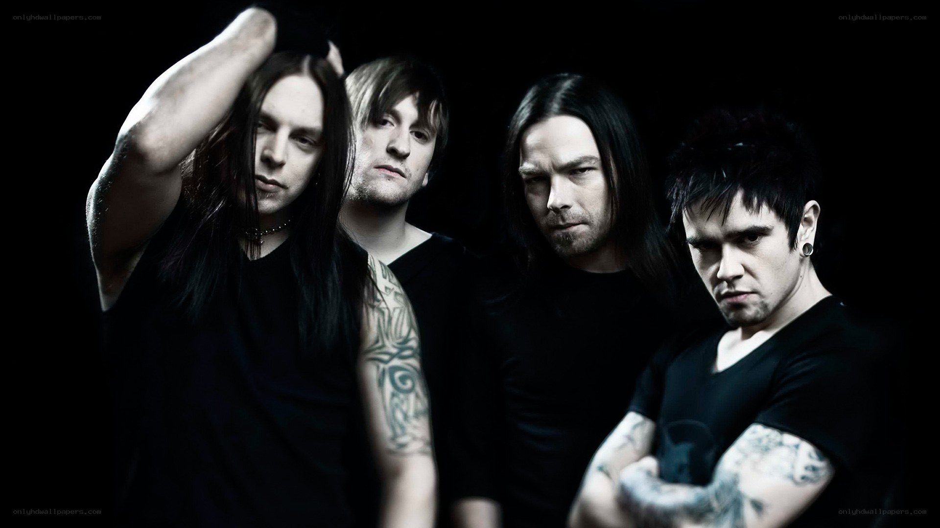 band members in dark setting