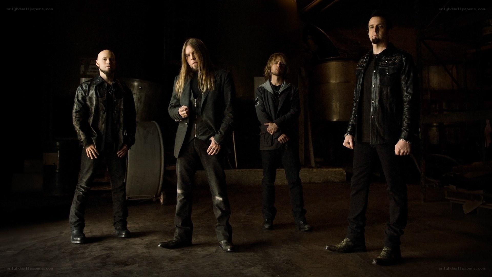 band members in dark setting