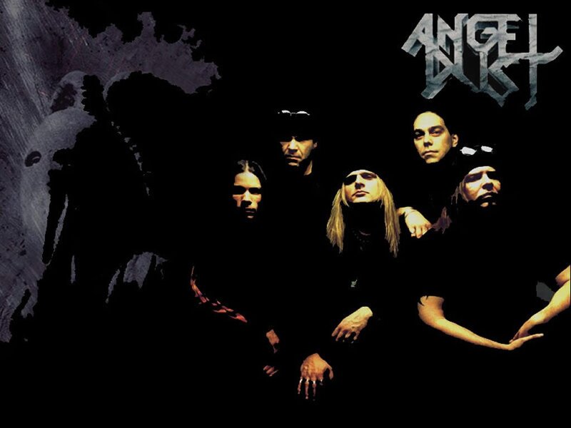 Band Members in Dark Setting — Black, Dramatic, Photograph, Band Logo