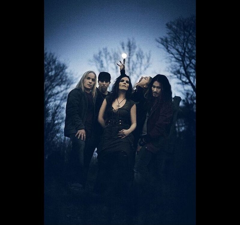 Band Members in Dark Setting — Blue, Dramatic