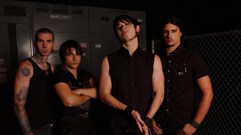 band members in dark setting