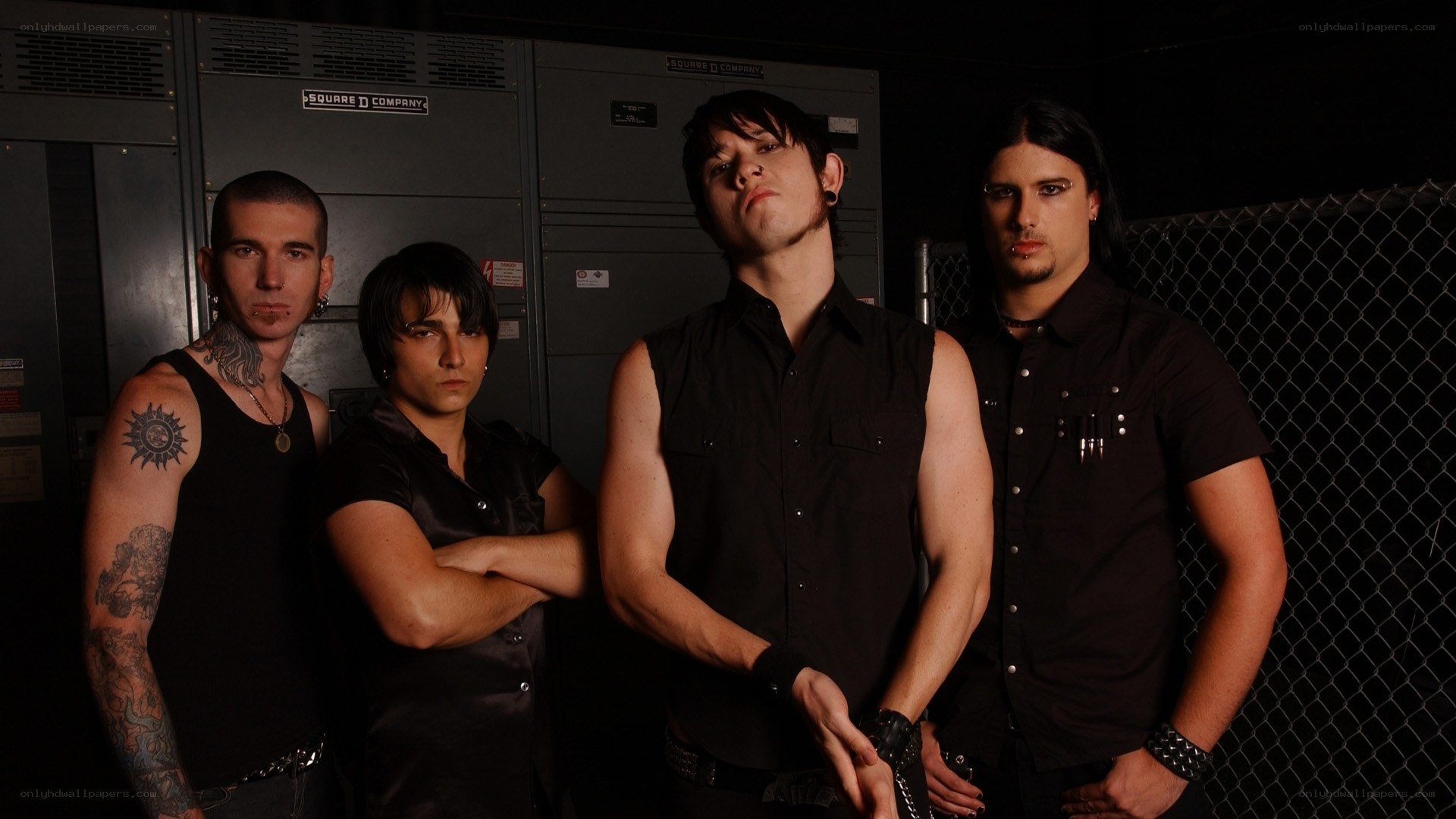 band members in dark setting