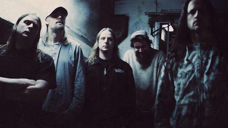 band members in dimly lit room