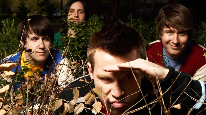 band members in foliage