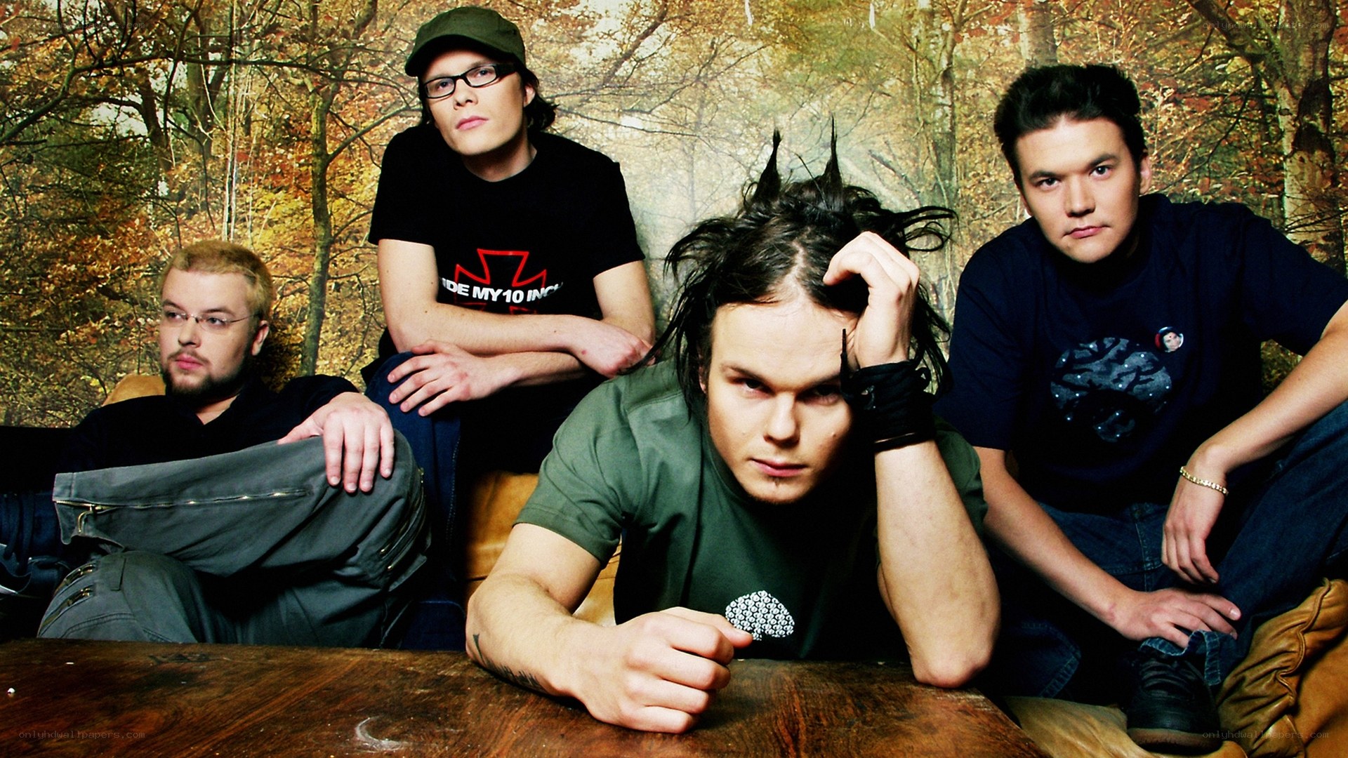 band members in forest setting