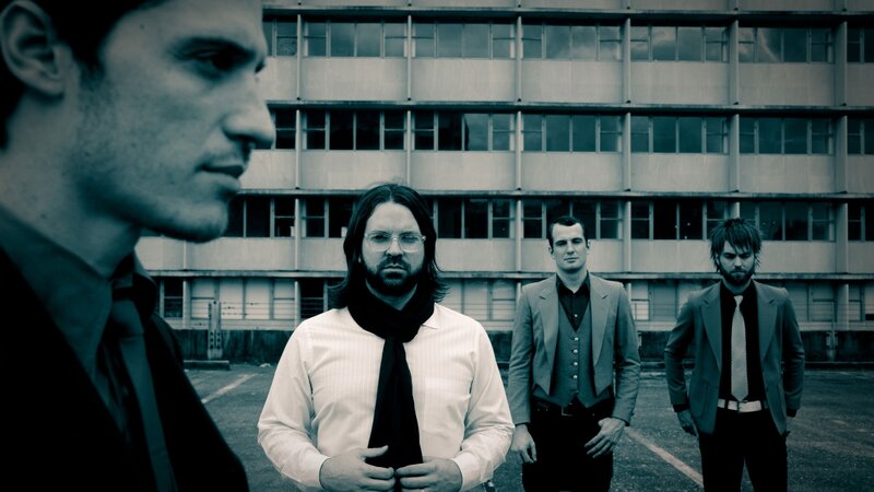 band members in front of building