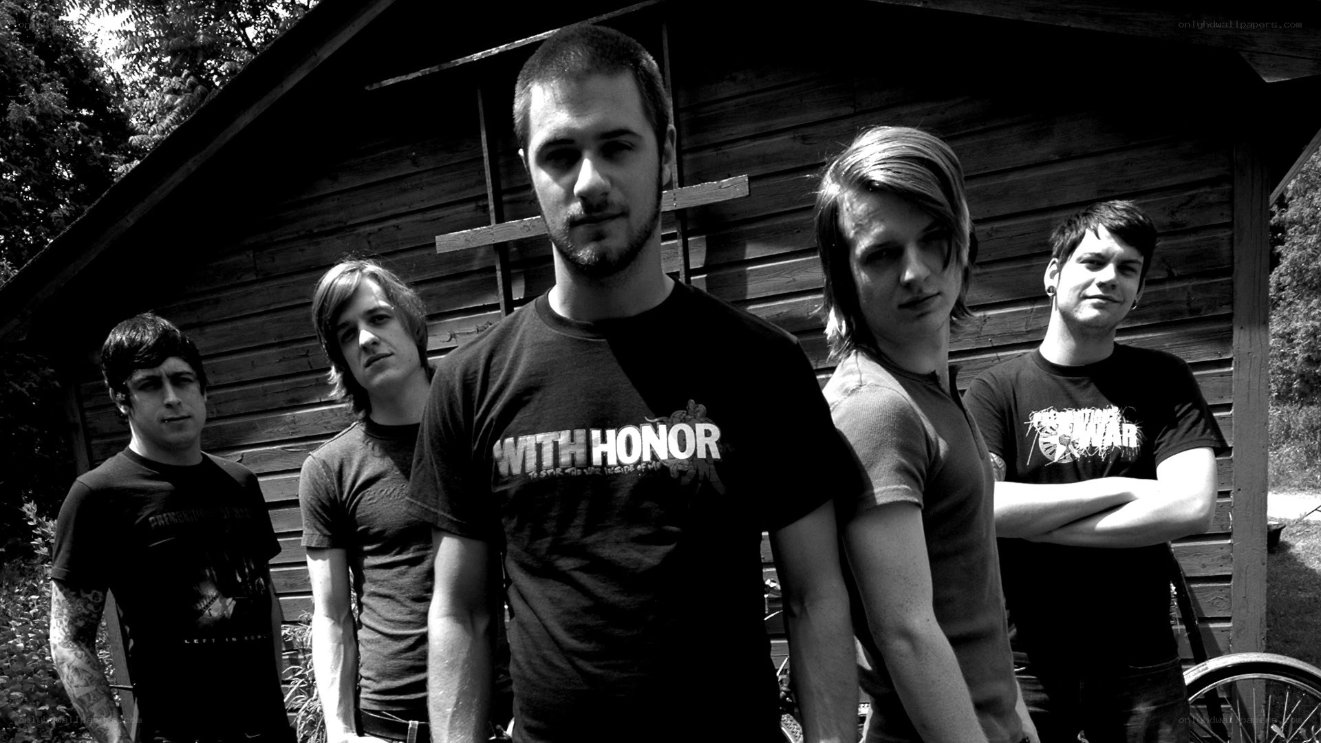 band members in front of shed