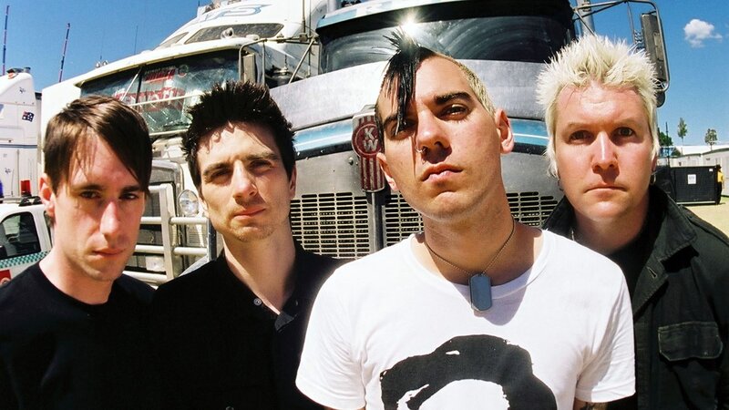 band members in front of truck