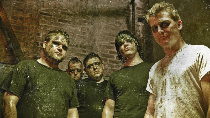band members in gritty setting