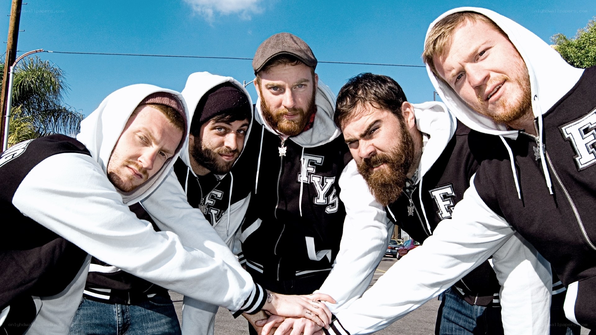 band members in hoodies