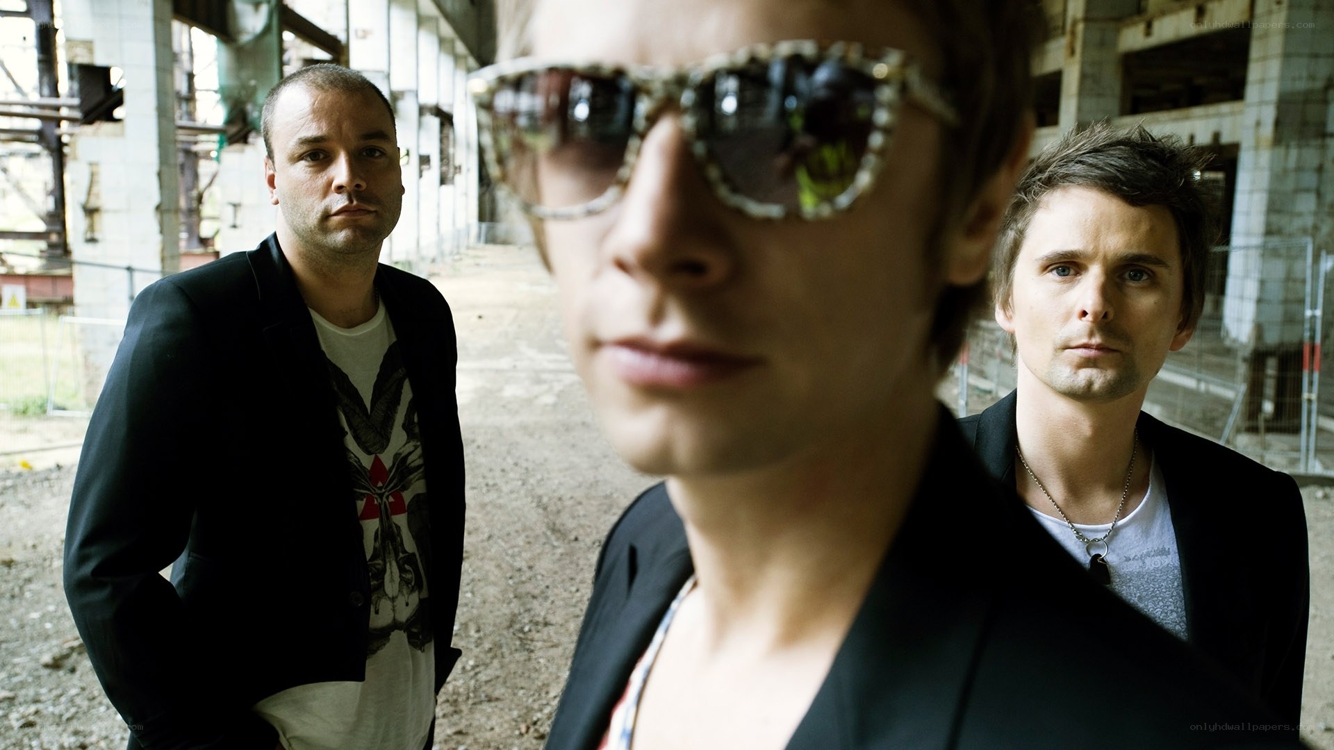band members in industrial setting