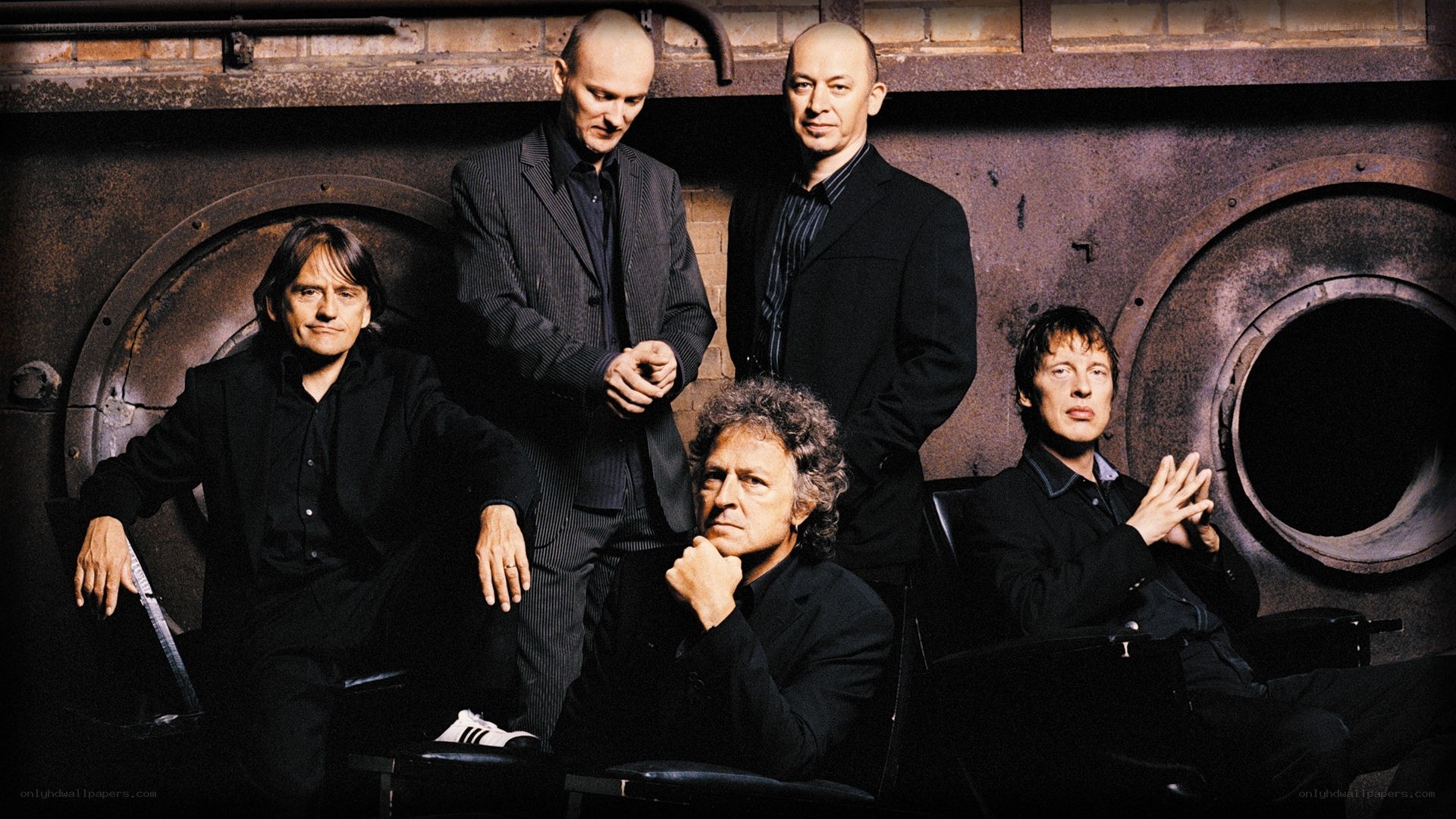 band members in industrial setting