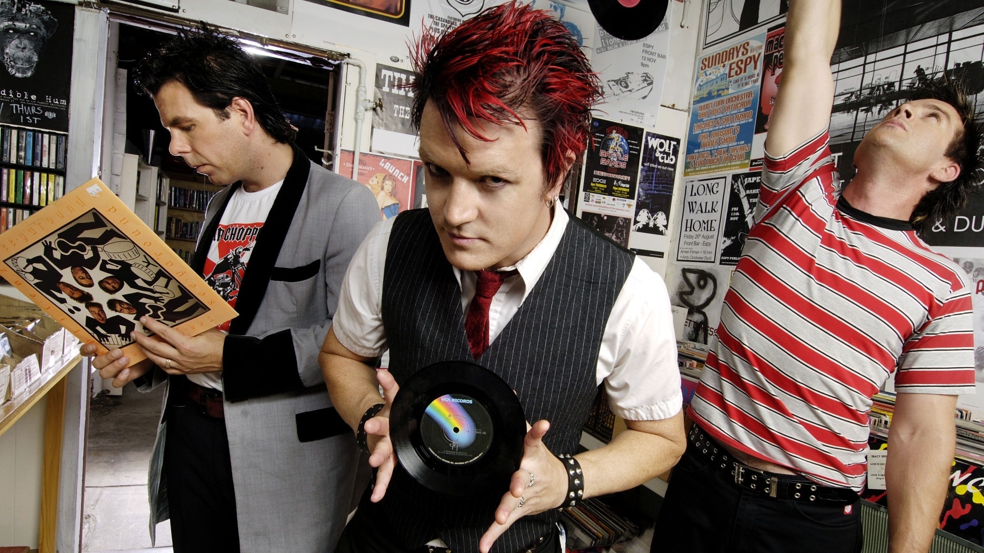 band members in record store