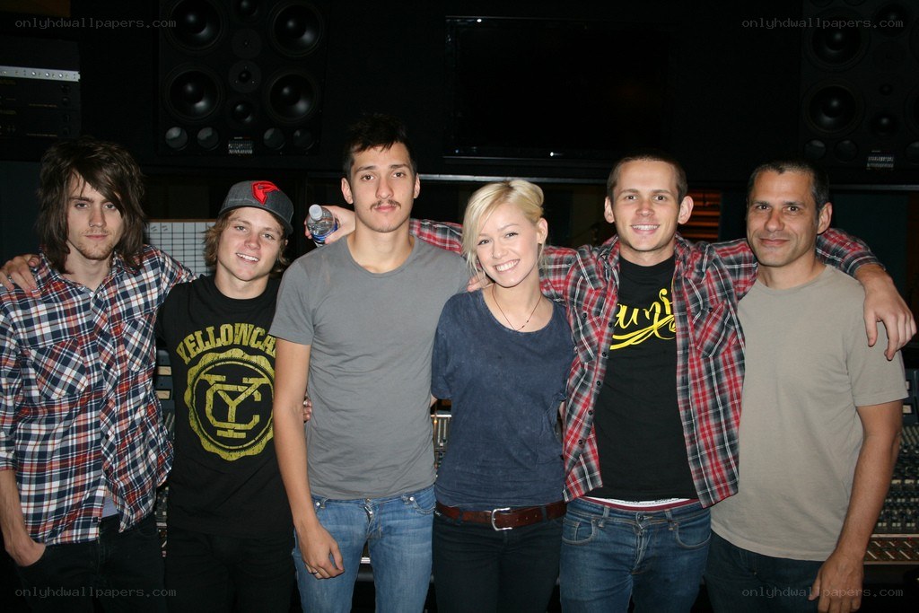 band members in recording studio