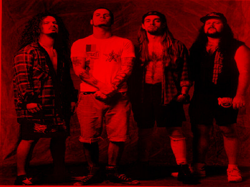 band members in red light