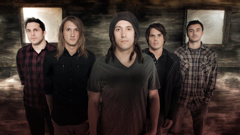 band members in rustic setting