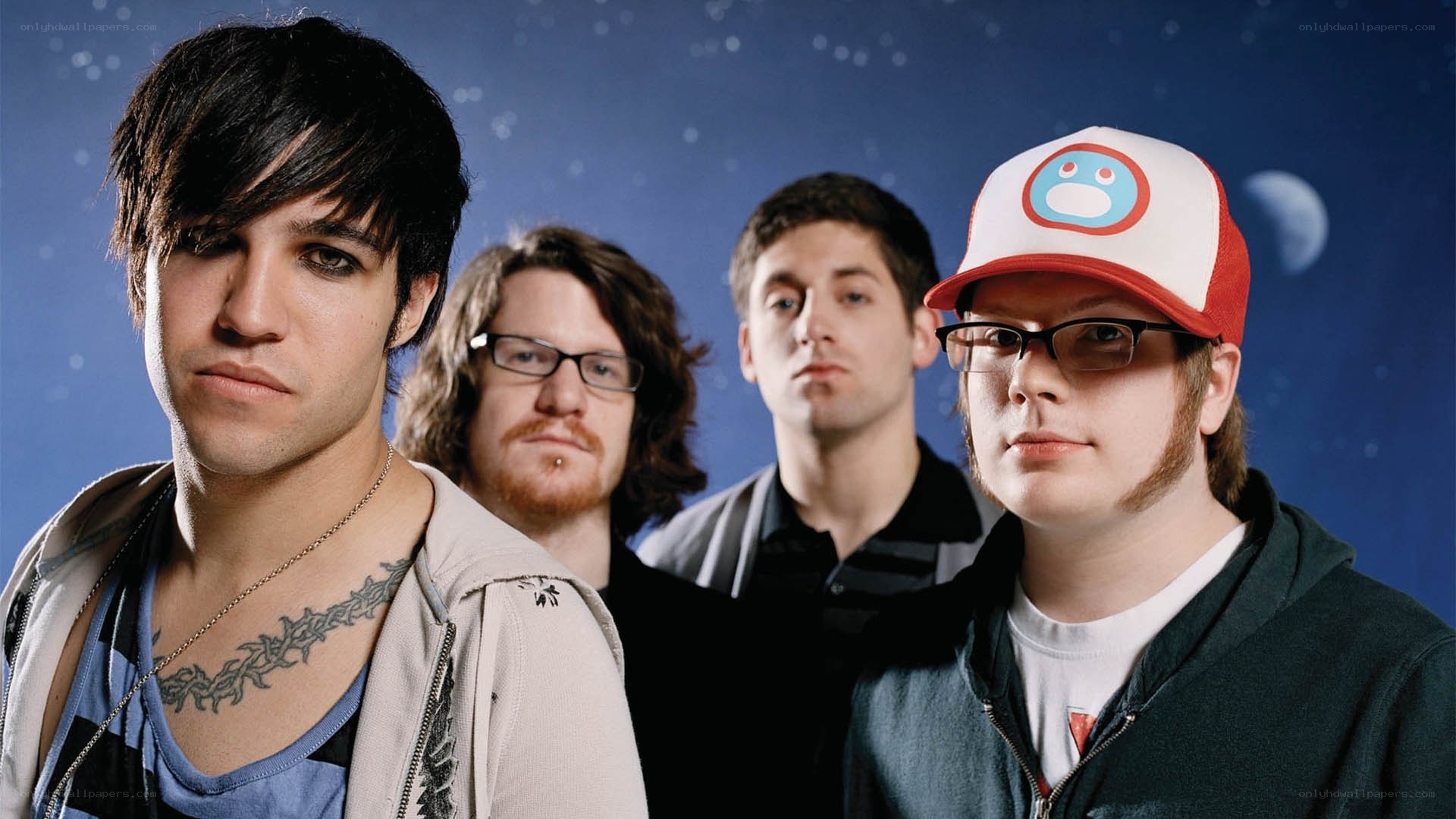 band members in space-themed photo