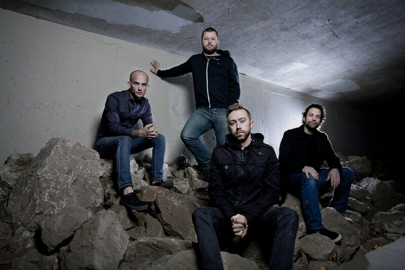 band members in underground setting