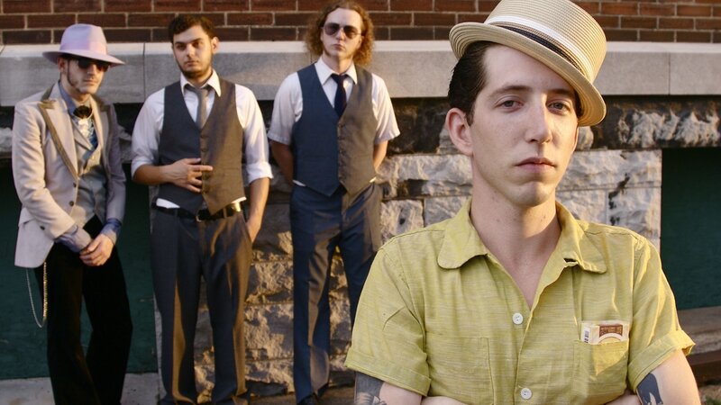band members in vintage attire