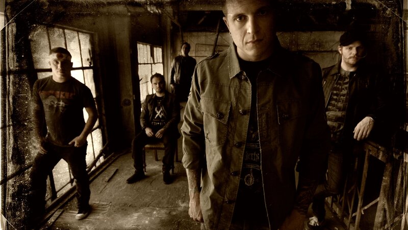 Band Members in Warehouse — Brown