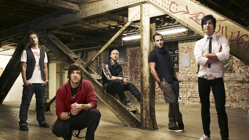 Band Members in Warehouse — Red