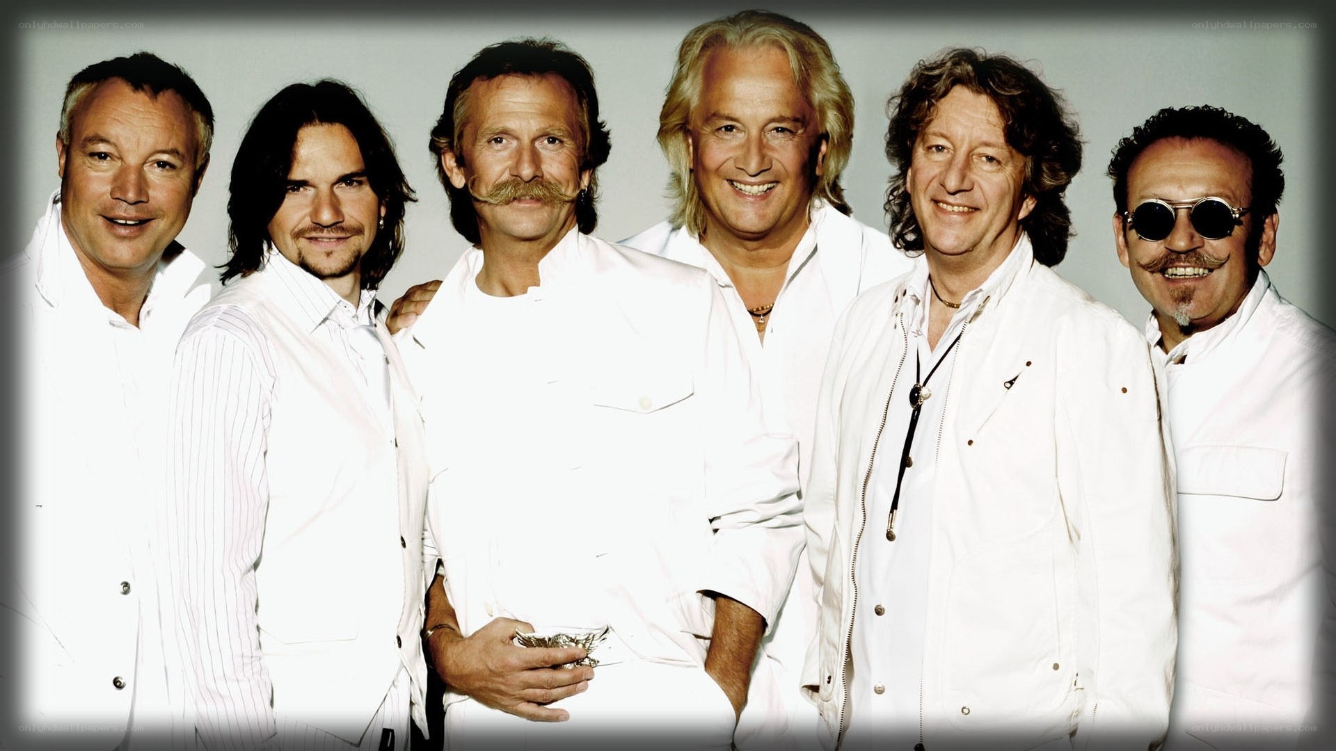 band members in white