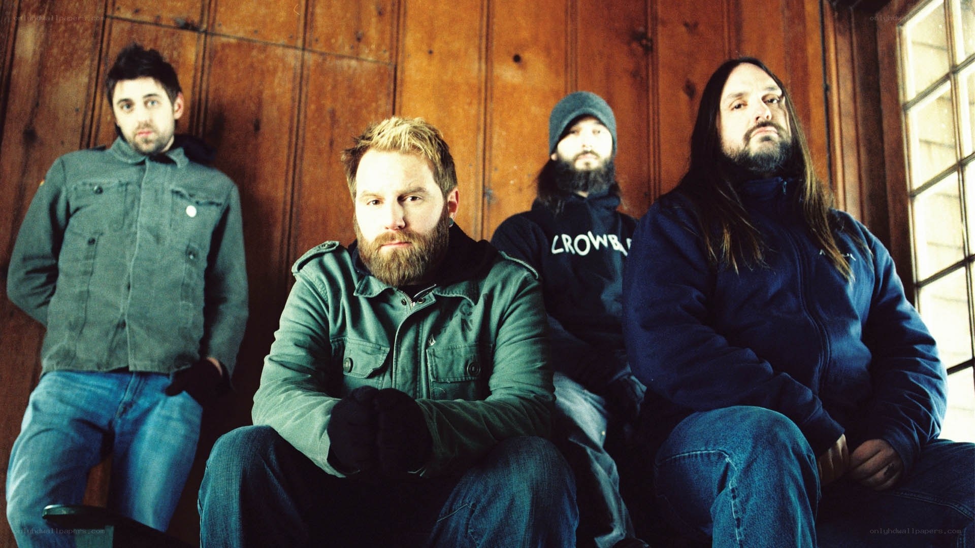 band members in wooden room