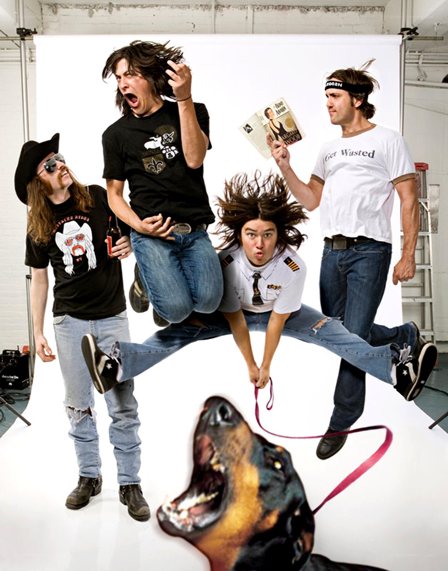 band members jumping in studio