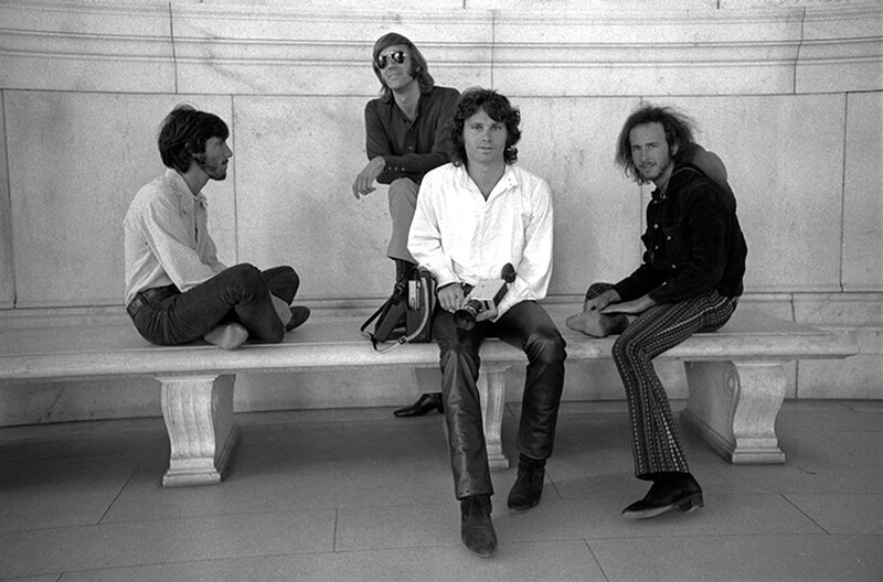 band members on a bench